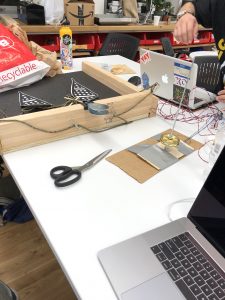 Our Rotary Encoder Attached to a Pulley Wheel and Stomp Pad Covering Applied over FSRs.